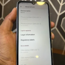 T-Mobile REVVL 8 actual About phone screen showing model TMRV085G